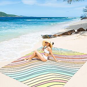 SkyNature Beach Blanket Sandproof Waterproof, Large Beach Mat for 2-4 Adults with Stakes $13.50