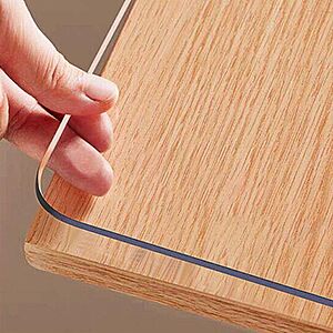 Prime Members: 14" x 24" OstepDecor 1.5mm Clear PVC Desk Mat & Table Protector $7.59 + Free Shipping
